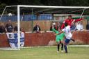 Drew Roberts scores one of his two goals against Highgate United.