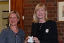 Judi Guy (right) receives a cheque on behalf of North London Hospice.