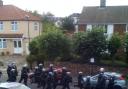 Clashes between rioters and police in Enfield Town