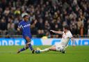 Chelsea's Raheem Sterling is tackled by Tottenham's Pierre-Emile Hojbjerg