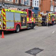 A child and two adults were led to safety by firefighters wearing breathing apparatus during a blaze in West Green Road, South Tottenham