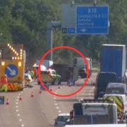The overturned horse box at the scene of the M25 crash, in Enfield