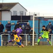Marcus Wyllie score his first and Enfield Town's second at Canvey Island. Picture: PHIL DAVISON