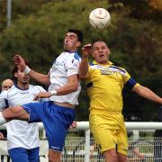 Darren Pulse (right) in action against Enfield Town. Picture: Phil Davison
