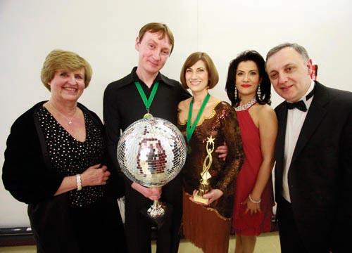 The Dancing Strictly judges award winners Tom and Thelia with their very own glitterball trophy