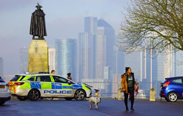 Enfield Independent: Police patrol as people take a walk in Greenwich, London, during England's third national lockdown to curb the spread of coronavirus