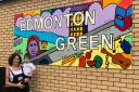 Doodle Designs founder Christina Kalinowski and her son Matteo in front of the artwork at Edmonton Green Shopping Centre