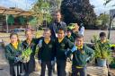 Cllr Ergin Erbil with group of Oakthorpe Primary School pupils. Picture: Enfield Council