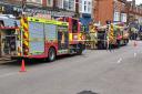 A child and two adults were led to safety by firefighters wearing breathing apparatus during a blaze in West Green Road, South Tottenham