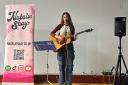 Natalie Shay performs for pupils at Enfield's St John & St James C of E Primary