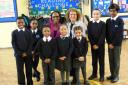 Mrs Rollins with Enfield councillor Ayfer Orhan and Enfield pupils