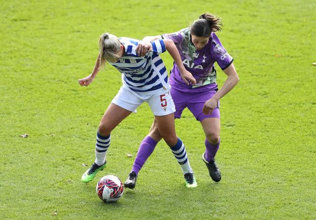 Enfield Independent: Reading's Gemma Evans (left) and Tottenham Hotspur's Rachel Williams battle for the ball during the Barclays FA Women's Super League match at the Select Car Leasing Stadium, Reading. Photo via PA/Bradley Collyer.