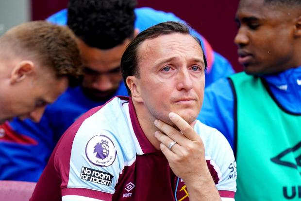 West Ham United's Mark Noble reacts after fans applaud him on his final home game for the club, ahead of the Premier League match at London Stadium, London. Picture date: Sunday May 15, 2022.