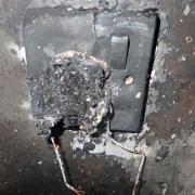 The damaged wall socket