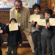 Lord Robert Winston with pupils from Keble Prep School in Winchmore Hill. Photo supplied by school
