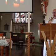 The Bishop of Edmonton, the Rt Revd Rob Wickham speaking at St Michael's Church