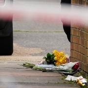 Flowers laid in respect to the stabbing victim