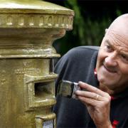 Royal Mail painted the post box golden on Wednesday