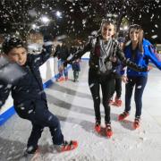 Teenagers enjoying the ice skating rink in Ponders End Park
