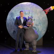 EDITORIAL USE ONLY(Left to right)David Walliams with Alice Bounce who plays Sheila on the stage of ‘The First Hippo on the Moon’, an adaptation of his book by Les Petits Theatre Company which received its world premiere at the Royal Hippodrome in