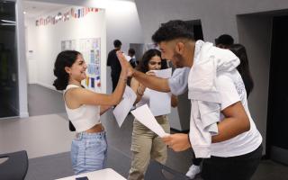 Students celebrating at The London Academy of Excellence Tottenham (LAET)