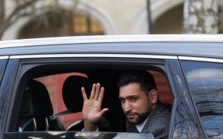 Amir Khan outside Snaresbrook Crown Court, London, where four men are on trial over the alleged gunpoint robbery of the former world boxing champion