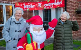 Visitors to Elizabeth Lodge for a Christmas get-together