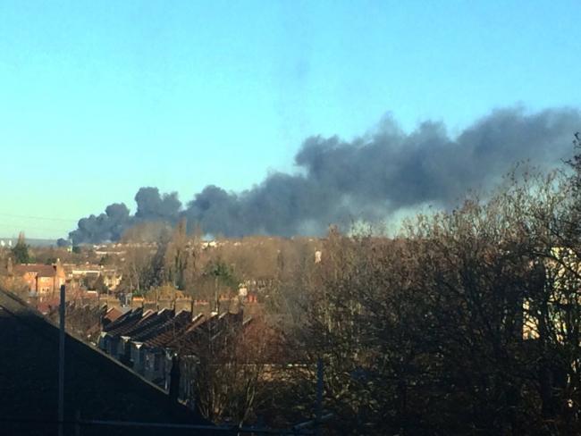 Smoke billowing across the skyline is seen from Walthamstow. Photo: Donna Marie London.